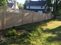 White cedar wood grain vinyl fence
